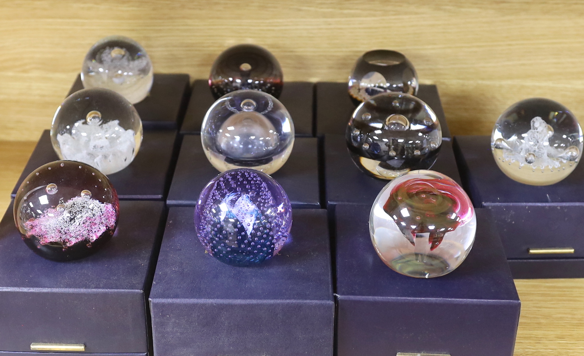 Ten Caithness paperweights, boxed, one limited edition